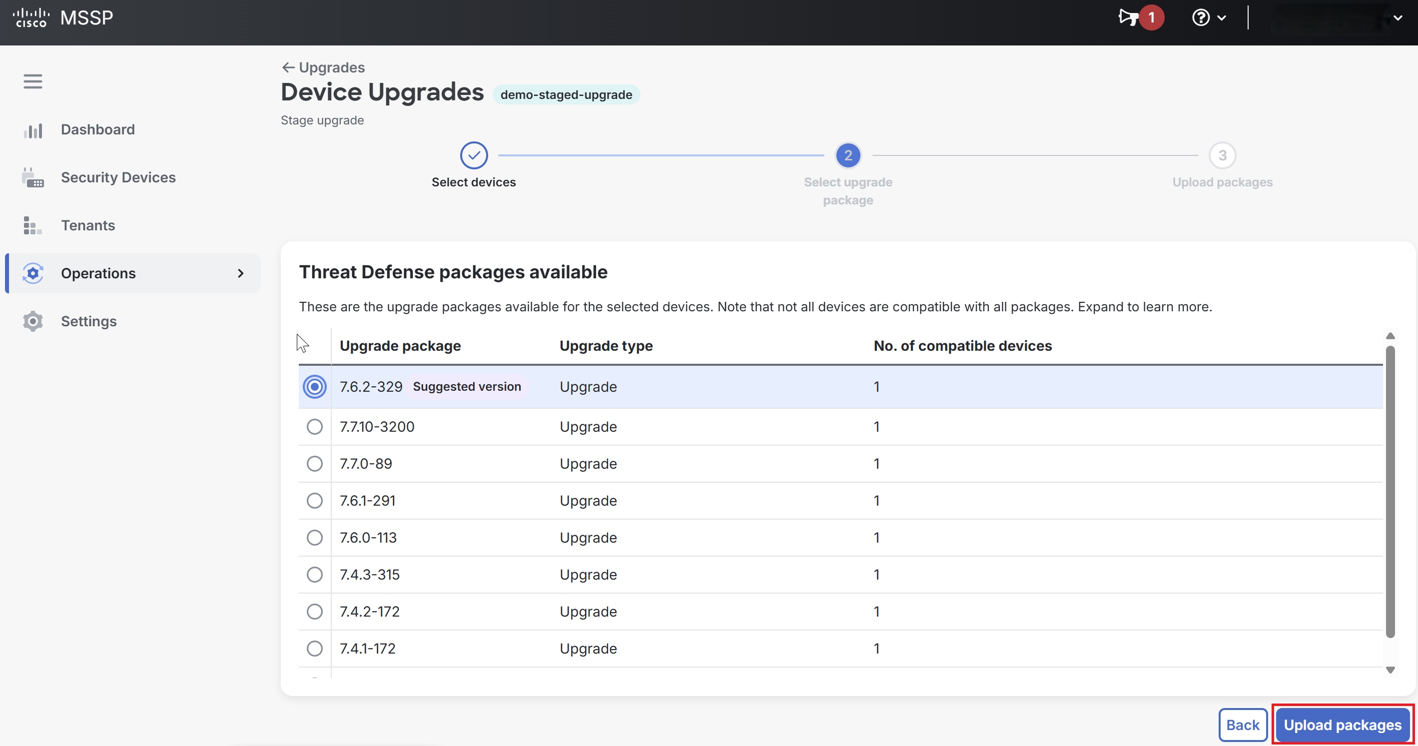 Screenshot of the Device Upgrades page showing the list of available Threat Defense packages